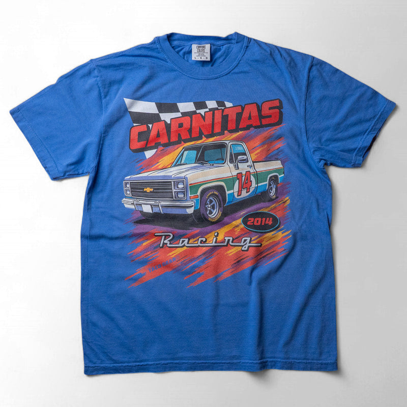 Taco Gear Carnitas Racing t-shirt featuring vintage pickup truck graphic, bold “Carnitas” text, and retro racing design on black and blue tees.