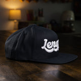 taco gear lengua snapback hat in black with white letters
